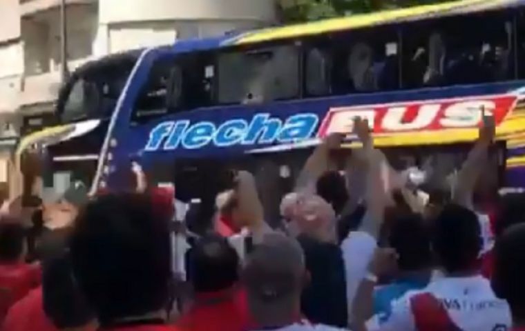 The Boca bus under attack by hooligans 