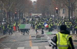 Protesters wearing their signature fluorescent yellow vests kept blocking several fuel depots. In Marseille, students clashed with police outside a high school