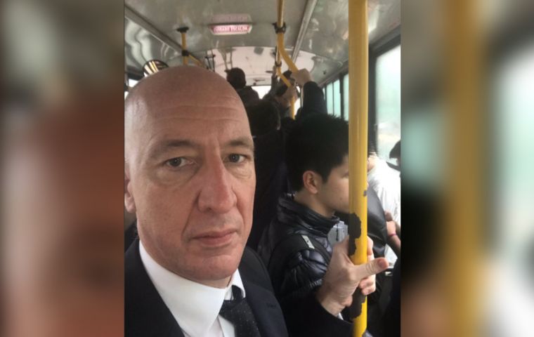 “What a storm. Returning soaking wet in the bus” twitted ambassador Kent, while sharing pics of him at the bus stop and in the crowded bus.(Pic Twitter)