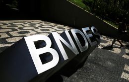 BNDES has 260 billion dollars of debts with the treasury, Estado said, and it is currently scheduled to pay back 26 billion reais next year