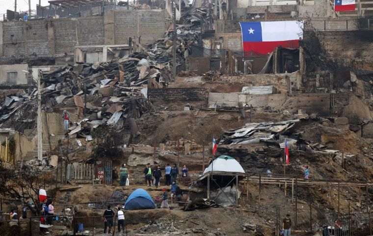 Chile’s Housing Ministry said it had identified 822 slums that largely lack access to basic services like water, sewage disposal and electricity
