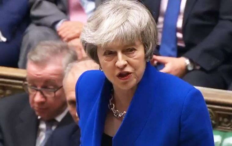The prime minister won a vote of no confidence by 325 to 306, as rebel Tory MPs and the DUP backed her to stay in No 10