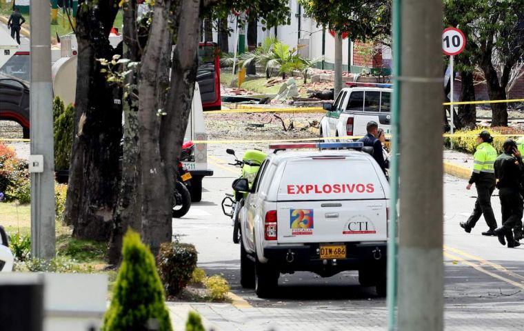 The scene outside the General Santander police academy was chaotic in the immediate aftermath of the midmorning attack
