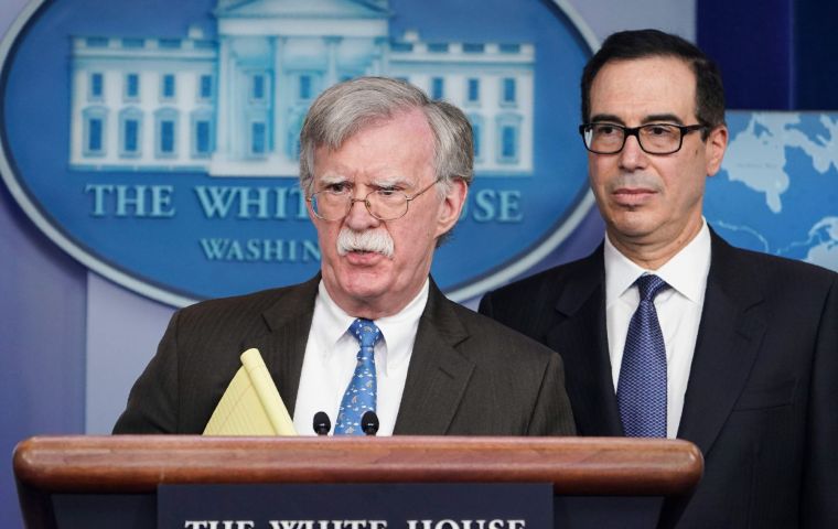 National security adviser John Bolton tweeted that traders should not deal in gold, oil or other commodities “being stolen” from the Venezuelan people