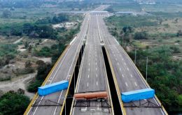 Late Tuesday, the army blocked a road on the Colombian border. Troops used a tanker truck and shipping containers to impede access to the Tienditas bridge