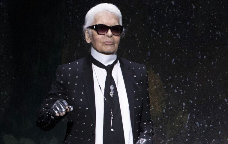Lagerfeld signature ponytail and dark glasses made him an instantly recognizable figure around the world