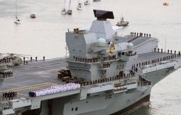 The ceremony took place on board HMS Queen Elizabeth, one of the RN’s two new carriers which VAdm Kyd recently led through her maiden F-35 fighter jet trials.