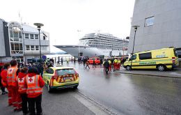 Hundreds of people were rescued from Viking Sky after it sent out a distress call on Saturday. The vessel later restarted three of its four engines and docked in Molde (Pic EPA)