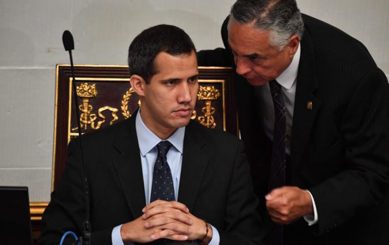 Supreme Court Justice Maikel Moreno said Guaido should be prosecuted for violating a Supreme Court ordered ban on his leaving the country