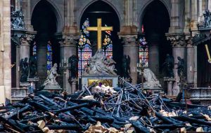 “We will rebuild Notre-Dame even more beautifully and I want it to be completed in five years, we can do it,” Macron said.