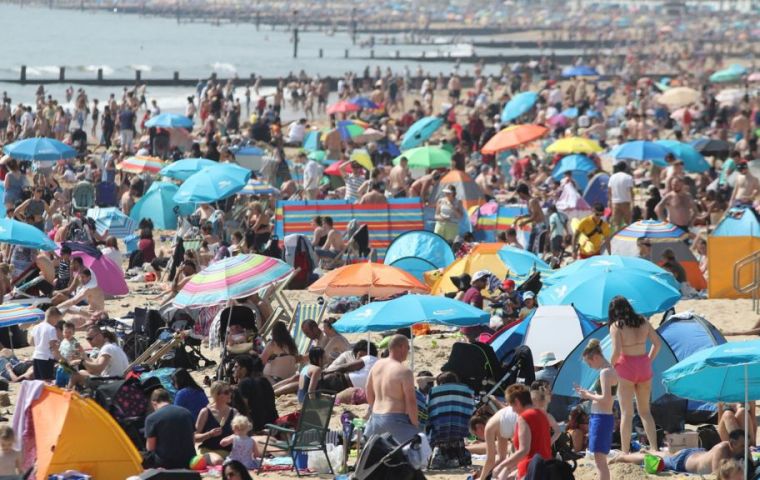 The good weather brought people in droves to beaches, parks and other outdoor attractions, while people queued to reach the top of Snowdon and Pen y Fan