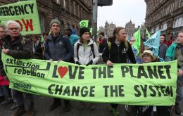 Extinction Rebellion took over the heart of London in a bid to focus global attention on rising temperatures and sea levels caused by greenhouse gas emissions.