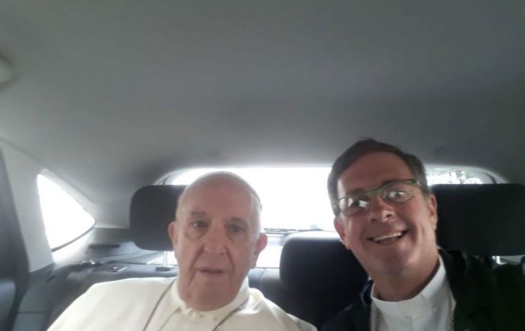 The Pope next to Bishop García Cuervas during a car ride in the Vatican   