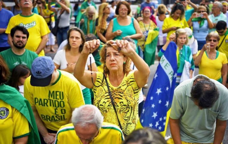Waving flags and chanting Bolsonaro's nickname “Mito”, protesters with T-shirts emblazoned with “My party is Brazil” demanded lawmakers speed up reforms