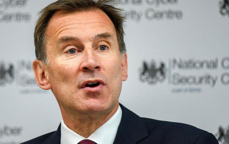 Foreign Secretary Hunt pledged to slash corporation tax, even in the event of a disorderly no-deal Brexit, to drive economic growth
