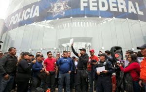  A huge crowd of angry police gathered outside the command center in a pre-dawn protest that lasted well into the day. Protest is scheduled to continue on Thursday