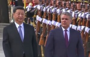 “The relay baton of China-Colombia bilateral ties is passed to us now,” Xi (L) told Duque (R).