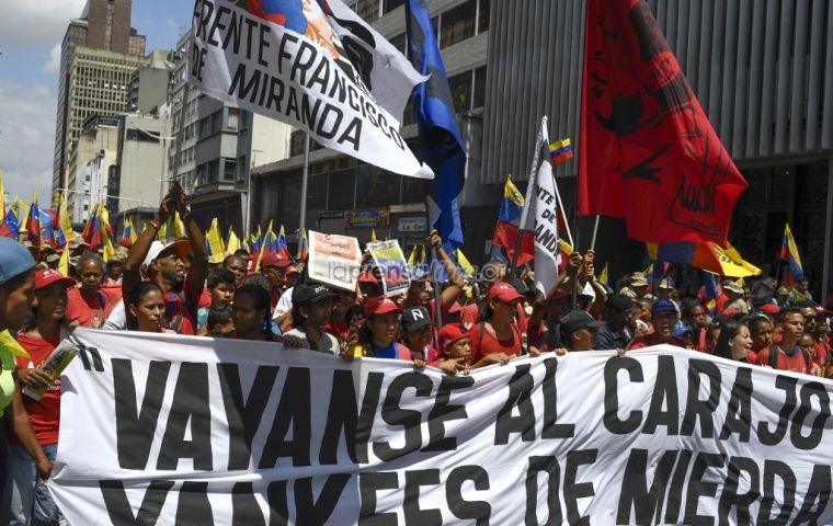 Made up mostly of civilian militia and public sector employees, the crowd chanted: “Yankee go home,” and “Hands off Venezuela.”