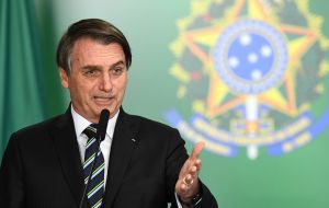 “He is a national hero who prevented Brazil falling into what the left wants today,” Bolsonaro told reporters before meeting with Ustra’s widow