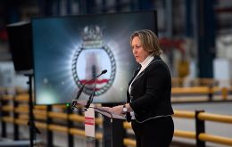Minister for Defense Procurement, Anne-Marie Trevelyan, pressed the button to start the plasma-cutting machine to work on a plate of steel