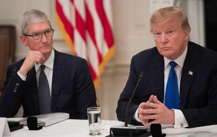 “I thought he made a very compelling argument, so I'm thinking about it,” Trump said of CEO Tim Cook, speaking with reporters at a New Jersey airport.