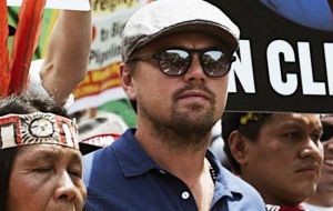 Di Caprio's Earth Alliance will give the money to local groups and indigenous communities as they work to protect the Amazon.