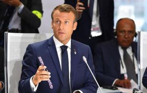 French President Emmanuel Macron, the summit host, said the situation has created economic uncertainty and urged both sides to reach an agreement.