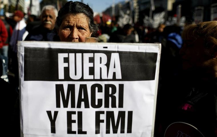 On the streets of Buenos Aires, protesters brandished banners slamming Macri’s economic austerity policies, rising poverty, and the IMF