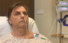 With the feeding tube still in his nose, Bolsonaro in a live broadcast on Facebook paid tribute to the doctors who he said had saved his life