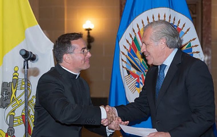 Monsignor Miles and Secretary General Luis Almagro during the ceremony