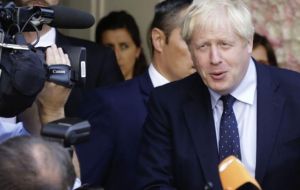 “The obvious thing to do is call an election. Jeremy Corbyn is talking out the back of his neck,” Johnson told reporters on a visit to New York.