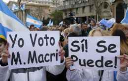 Tens of thousands of people waving Argentine flags or banners with slogans saying “Vote for Macri” and “Together we can do it” gathered in the capital (Pic Clarin)