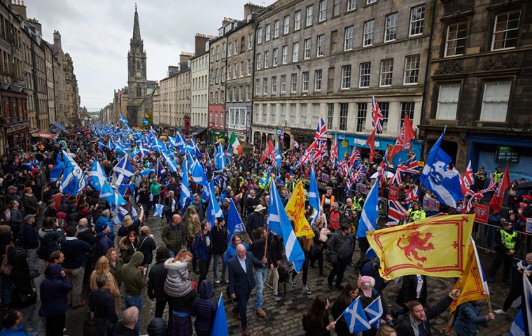  The demonstrators, many carrying Scottish flags, some wearing kilts and a few playing bagpipes - set off from Holyrood Park in the heart of the Scottish capital.