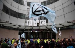  Holding banners with slogans “Planet Before Profit”, waving flags, singing and chanting, a few dozen demonstrators gathered outside of the BBC's main building