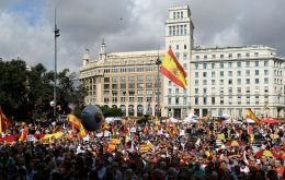 Waving Spanish - and some Catalan - flags and carrying anti-independence banners, 10,000 people marched in the city centre, according to police.