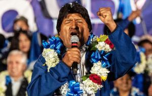 “I ask you for five more years to complete our great projects,” he told supporters at one stop, wearing the blue of his Movement for Socialism (MAS) party.