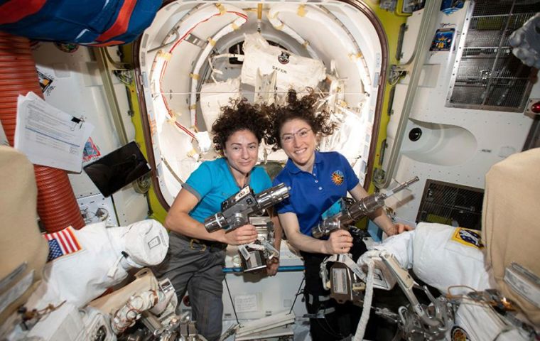 Friday marks Koch's fourth spacewalk and Meir's first spacewalk. Koch led EVA and can be identified by the red stripes on her spacesuit and life support backpack