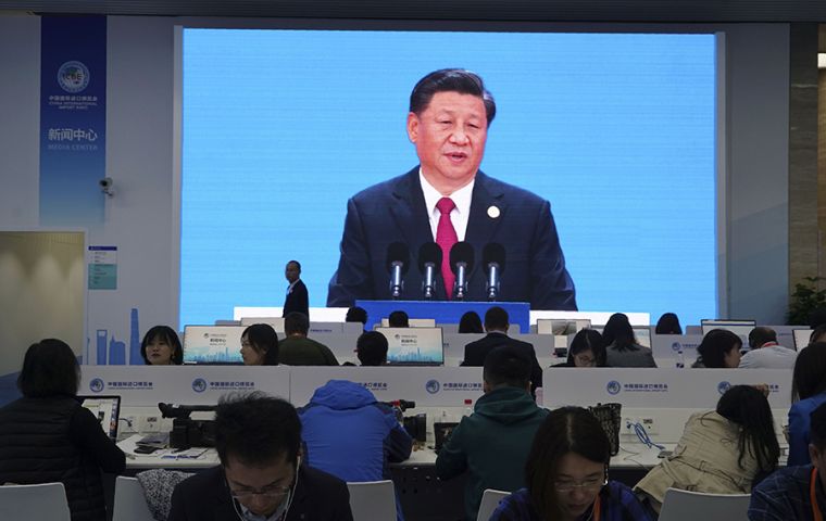 Xi addressed an audience including French President Emmanuel Macron at the Shanghai import exhibition, staged annually by China