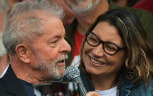 Lula was flanked by his girlfriend Rosangela da Silva, whom he kissed on stage and had promised to marry after leaving jail