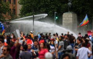 Thousands gathered at Santiago's Plaza Italia (Dignity Plaza) square where they chanted and held banners