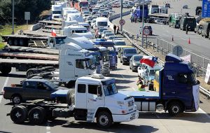 Truck drivers and other protesters set up barricades on at least two major highways, prompting the Valparaiso-based Congress to shut down for the day.