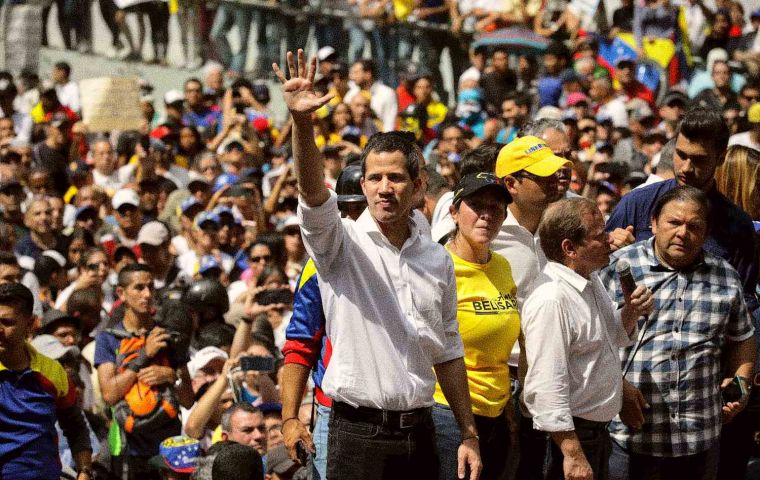Protesters waved Venezuela's red, yellow and blue flag in a show of support for opposition leader Juan Guaido