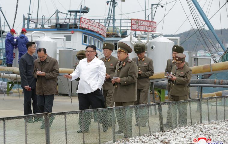 Kim's visit to the fish processing plants was splashed across a two-page spread in state newspaper Rodong Sinmun