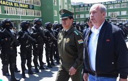 Interior minister Arturo Murillo reviewed the ranks of masked, black-clad troops that make up the new force, called the GAT, at the ceremony in La Paz.