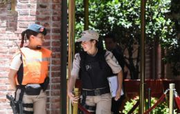 Prefectura officers mount guard and handle the investigation at the Hotel Faena. 