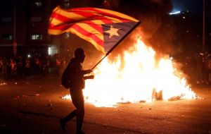 Thousands of protesters gathered outside the stadium, chanting “Independence” and “Free political prisoners”