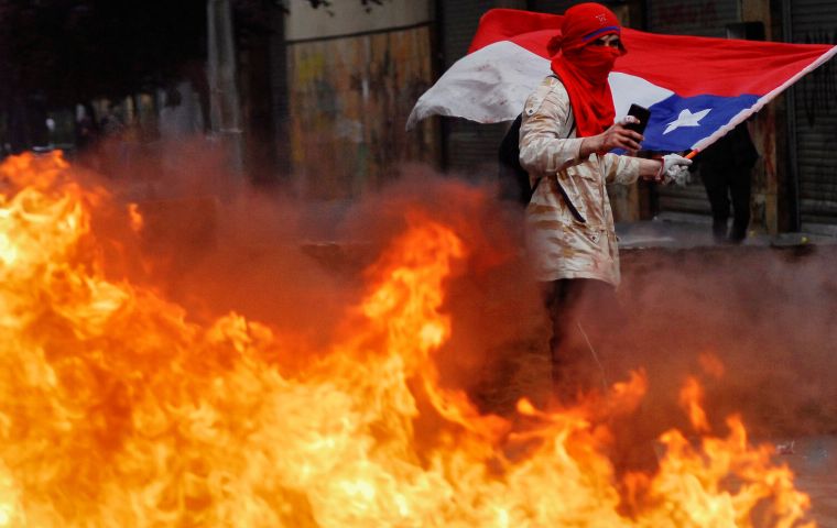 Protests have rocked Chile for two months, leaving 26 dead and causing billions of dollars in losses for private businesses and public infrastructure. (Reuters)