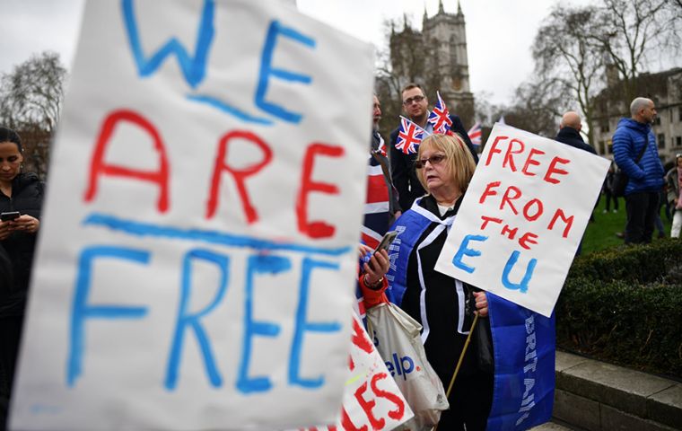 Thousands of people waving Union Jack flags packed London's Parliament Square to mark the moment of Brexit at 11pm - midnight in Brussels.