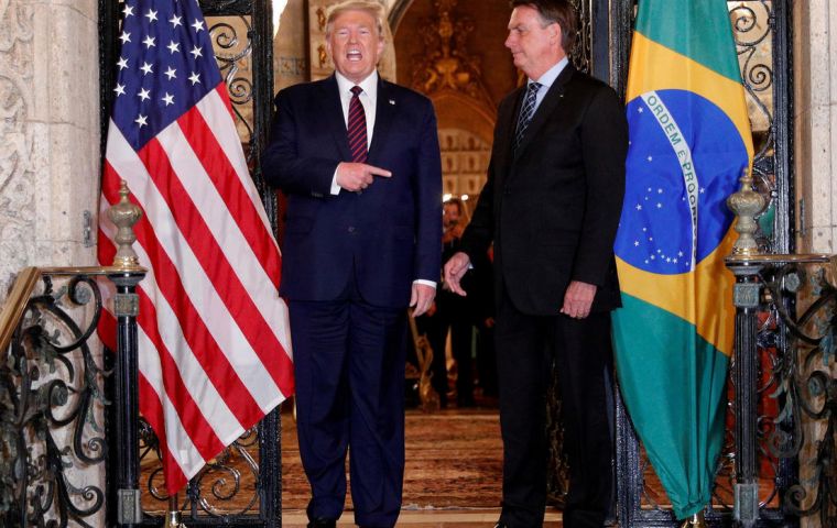  “Brazil loves him and the U.S.A loves him,” Trump said in brief remarks to reporters before their dinner