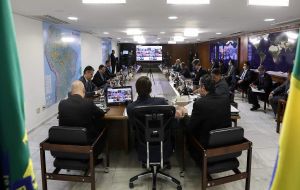 Brazil’s president, Jair Bolsonaro, during a video link meeting of the G20 on Thursday. Global leaders are pledging a “united front” to fight the outbreak